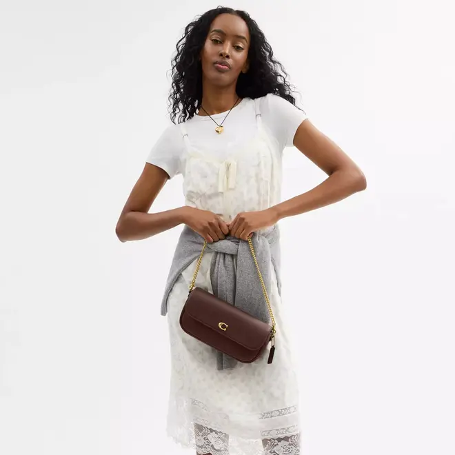 BOLSA COACH NEW YORK BROOK FLAP CHAIN MARROM